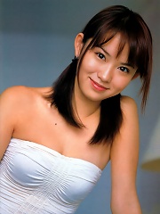 Hot gravure idol is saucey and steamy in her short silver skirt